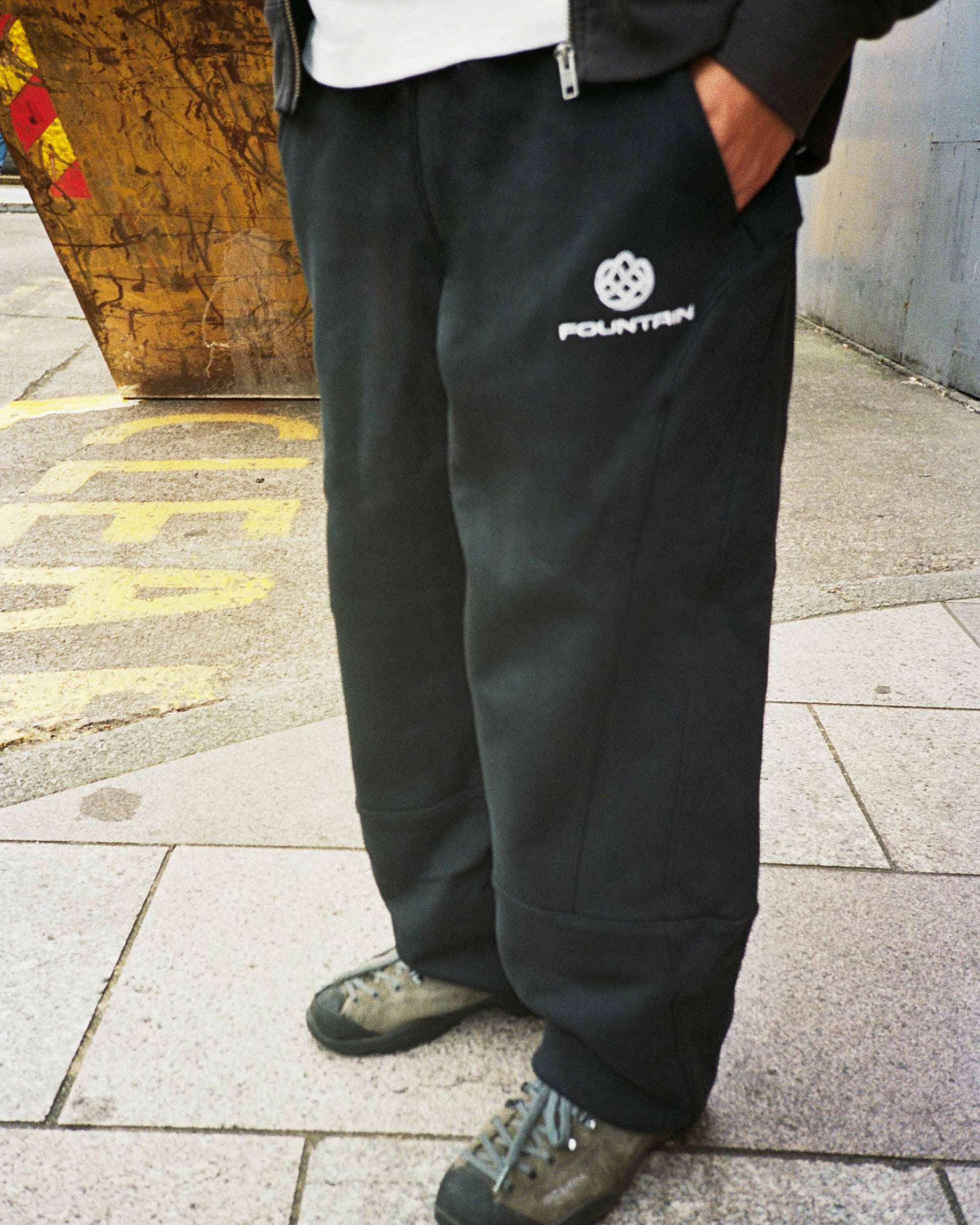 Monogram Joggers in black, worn