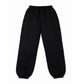 Monogram Joggers in black, back view, laid flat